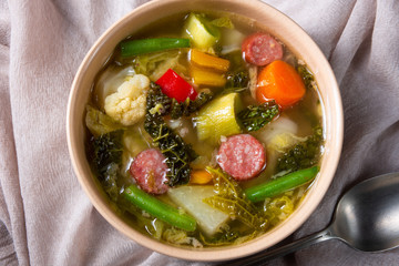 delicious autumnal vegetable soup with sausage and bacon