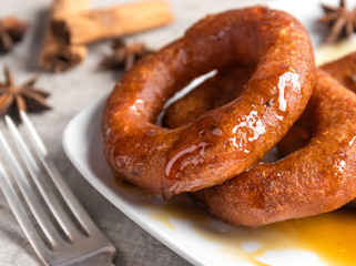 Peruvian classic dessert, picarones with honey