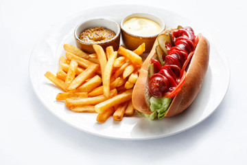 hotdog and french fries on white background