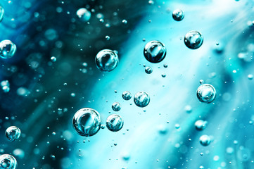 Beautiful turquoise water structure. Air bubbles under water macro.