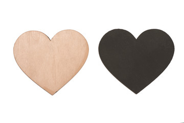 Wooden and black heart on white isolated background