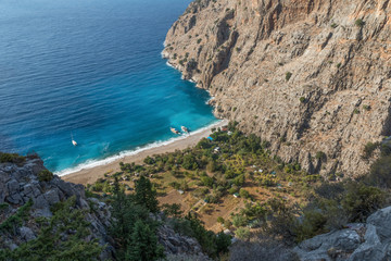 Fototapeta na wymiar Ölüdeniz, Turkey - one of the most wonderful resorts of the Southern Turkey and probably of the Mediterranean Sea, the Butterfly Beach is famous for its turquoise water and the breathtaking landscape