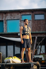 Man Standing on a Pier