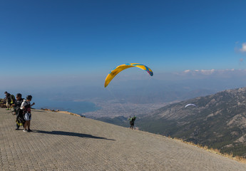 Babadağ, Turkey - standing about 2000 meters above the sea level, and right beside the Mediterranean Sea, the Mount Babadağ is an ideal spot for enjoying an unique view during paragliding