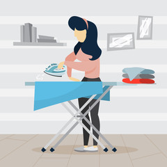Woman iron clothes on the ironing board