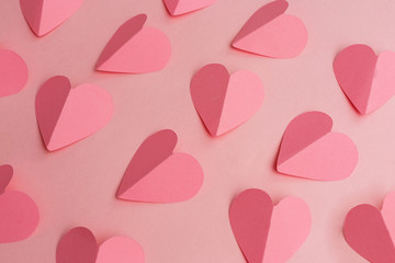 Valentine's Day background made of pink paper hearts