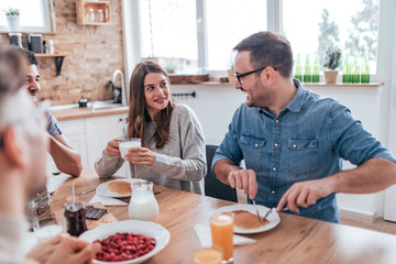 Enjoying breakfast at home.