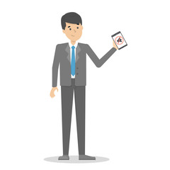 Man holding mobile phone in hand. Silence symbol