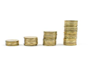coins on an isolated background. Saving money, accumulating for the realization of a dream.