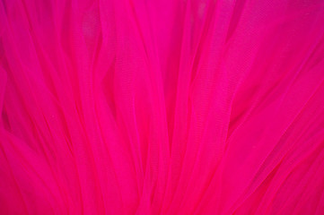 Coral draped textured fabric as background