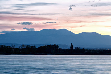 landscape in a lake at sunset