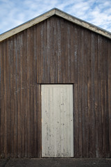 Old wooden wall with door