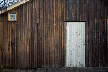 Old timber wall with timber door