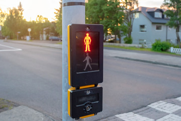 Photo of traffic light with red pedestrian