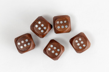 Dice made of wood showing six's