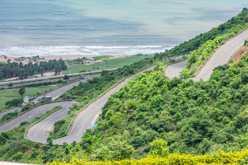 multi layer road going on a mountain looking awesome with beach background.