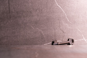A key and stone background.