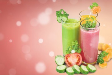 Healthy  vegetable juices on background