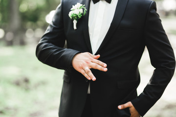 Headshot portrait of young man smiling isolated on outside outdoors background