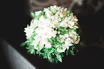 Beautiful wedding bouquet with different flowers, roses