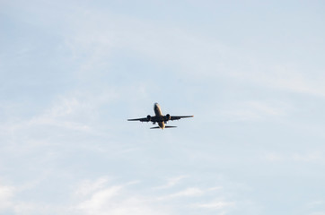 Fototapeta na wymiar Airplane in The Sky
