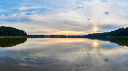 Beautiful panoramic view of the sunset over Lemiet lake in Mazury district, Poland. Fantastic travel destination.