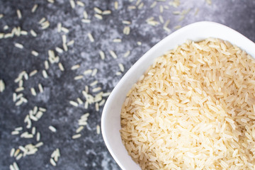 Rice in a plate on the table, background