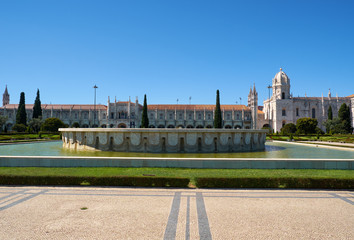 Empire Square with the fountain and  Jeronimos Monastery. Lisbon. Portugal