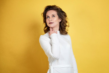 portrait of a middle-aged woman with a dreamy face, sad thoughts. the woman thought about something sad