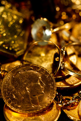 Gold coins over dark background