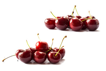 Fresh red cherries isolated on white background. Cherry fruit with copy space for text. Ripe cherry on a white background.
