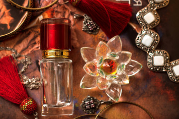 Glass perfume bottles based oils. A Bazaar, market. Macro. Gold and pink gamma