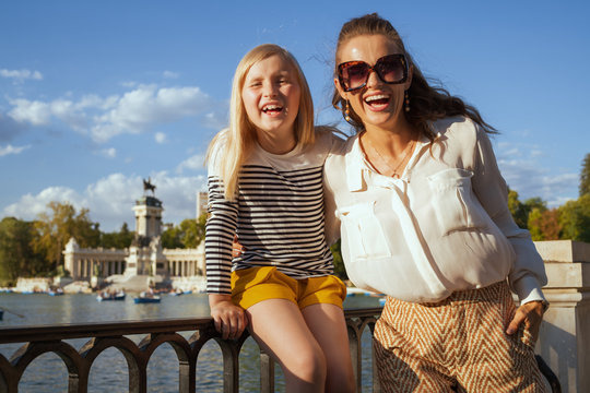 mother and child tourists at El Retiro Park in Madrid, Spain