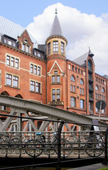 Fototapeta na wymiar View to the popular and historic district Speicherstadt in Hamburg - Germany