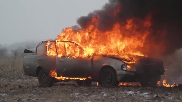Car On Fire, Burning Car In The Field