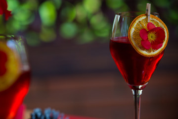 Chinese New Year party table in red and gold theme with food, drinks and decorations