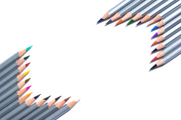 Pencils lay in the shape of frame isolated on the white background