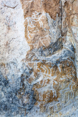 Baikal Lake. Rock paintings of ancient deers and the warrior on horse on the famous rock of Sagan-Zaba. Tourist landmark