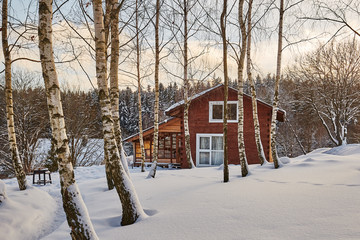 Winter house on winter snowy panoramic landscape