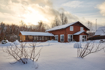 Winter house on winter snowy panoramic landscape