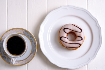Colorful Donuts with Coffee in White Background