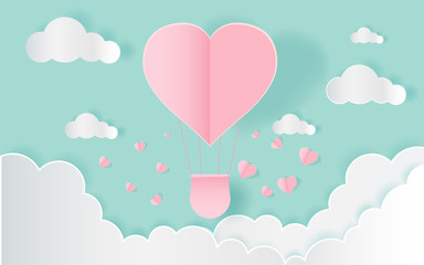  love and valentine day,Origami made hot air balloon flying on the sky with heart float on the sky.paper art 