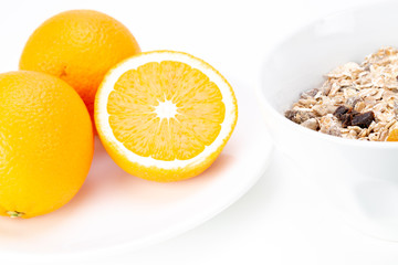 Balanced breakfast with muesli bowl and fresh orange juice