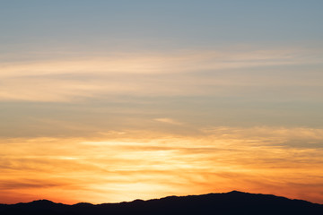 Sky gradient from blue to orange sunset