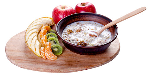 Fruits and nuts with milk on a white background. Healthy food. Food for weight loss.