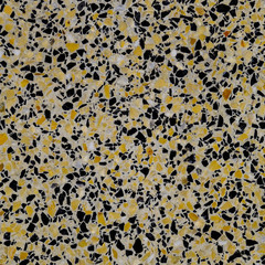 Marble tiles interspersed with granite. The texture of paving sl