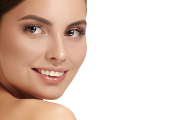 Fototapeta premium The beautiful female face. The perfect and clean skin of face on white. The beauty, care, skin, treatment, health, spa, cosmetic concept