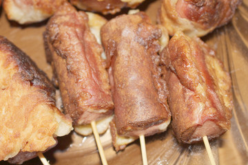Sausages fried in batter. Sausages in the dough. Hot Dog. Sausages on skewers. Deep fried. Food. Breakfast.