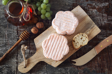 French Saint Albray cheese, honey and slices of baduette