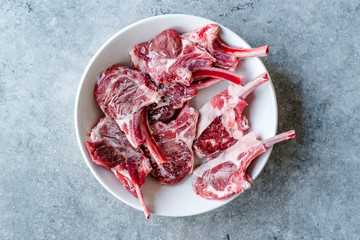 Raw Frozen Bloody Lamb Chops Meat in Plate